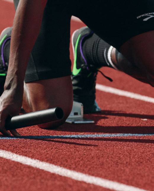 man on running field